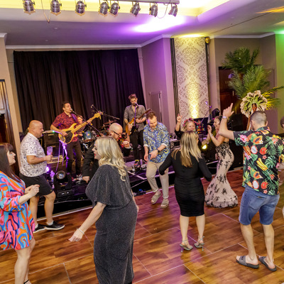 Guests Dancing To Band