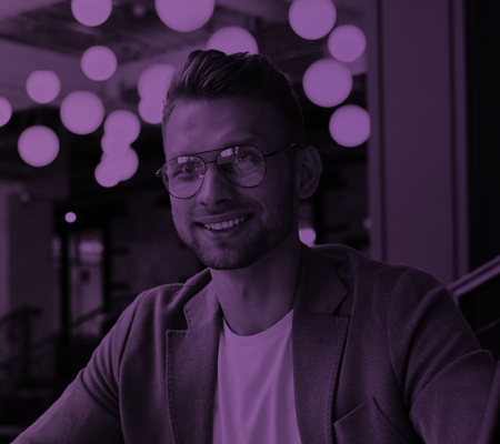 Man on laptop smiling