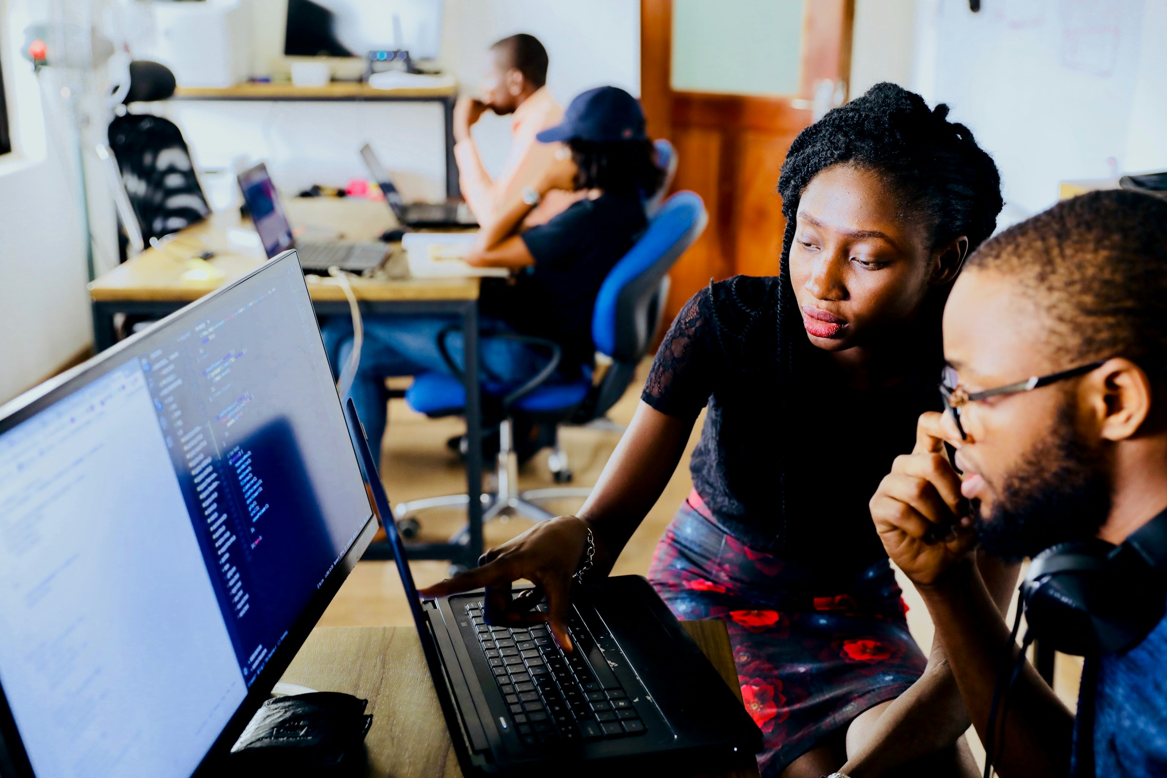 Apprentices at a Computer